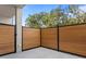 Fenced backyard featuring a wood fence with black trim, as well as a concrete patio at 532 W Plaza Pl # 3, Tampa, FL 33602