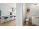 Bathroom and kitchen view showcasing elegant fixtures, lighting and sleek cabinetry at 532 W Plaza Pl # 3, Tampa, FL 33602