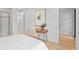 Bright bedroom featuring a desk area with a chair and art on the wall at 532 W Plaza Pl # 3, Tampa, FL 33602