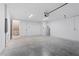 Spacious garage with white walls and concrete flooring, ready for customization at 532 W Plaza Pl # 3, Tampa, FL 33602