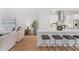 Open-concept living room and kitchen with modern furnishings and a sleek breakfast bar at 532 W Plaza Pl # 3, Tampa, FL 33602