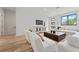 Bright living room featuring modern decor, hardwood floors, and a large window at 532 W Plaza Pl # 3, Tampa, FL 33602