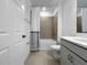 Modern bathroom with a shower-tub combo and neutral tile at 5336 Patano Loop, Palmetto, FL 34221