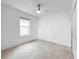Bright, spacious bedroom with neutral carpet and ample natural light from the window at 5336 Patano Loop, Palmetto, FL 34221