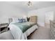 Bright bedroom featuring plush bedding and neutral décor at 5336 Patano Loop, Palmetto, FL 34221