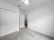 Bright bedroom with double closet doors, neutral carpet, and ample space at 5336 Patano Loop, Palmetto, FL 34221