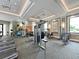 A view of the community fitness center featuring modern exercise equipment and a bright, spacious layout at 5336 Patano Loop, Palmetto, FL 34221