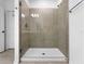 Modern walk-in shower with glass enclosure and tiled walls at 5336 Patano Loop, Palmetto, FL 34221