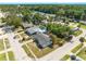 Aerial view of neighborhood homes, mature trees and street at 5618 Halifax Dr, Tampa, FL 33615
