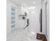 Open kitchen featuring stainless steel appliances, granite counters, and modern lighting at 5618 Halifax Dr, Tampa, FL 33615