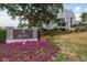Ardea Country Club sign with vibrant landscaping welcomes you to the community at 60 Birdsong Ct, Oldsmar, FL 34677