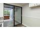 View of the kitchen and the outdoor tiled spa area at 60 Birdsong Ct, Oldsmar, FL 34677