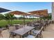 Outdoor patio with comfortable seating and scenic golf course views, great for dining at 60 Birdsong Ct, Oldsmar, FL 34677