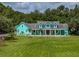 Home boasts mature landscaping and a spacious front yard, perfect for outdoor enjoyment at 7427 20Th St, Zephyrhills, FL 33540