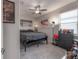 A stylish bedroom features a gray color scheme, unique decor, and carpet flooring at 9672 Ivory Dr, Ruskin, FL 33573