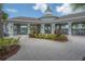 Pool community center featuring covered seating and lush landscaping at 9672 Ivory Dr, Ruskin, FL 33573