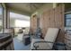 Relax on this lanai featuring a seating area, providing a perfect setting to enjoy the outdoors at 9672 Ivory Dr, Ruskin, FL 33573