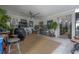 Open living space with a large entertainment area, diverse decor, and inviting, natural light at 9672 Ivory Dr, Ruskin, FL 33573