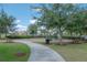A fun community playground with slides, swings, and plenty of space for to play at 9672 Ivory Dr, Ruskin, FL 33573