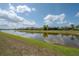 Beautiful view of the large pond at the back of the property at 9672 Ivory Dr, Ruskin, FL 33573