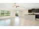 Open kitchen featuring modern stainless steel appliances, and ample countertop space at 9814 Quadrangle Ct, Sun City Center, FL 33573