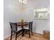 Cozy dining area showcases a view to the kitchen and lots of light at 3078 Eastland Blvd # 205, Clearwater, FL 33761
