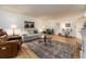 Open-concept living area with hardwood floors and lots of natural light at 3078 Eastland Blvd # 205, Clearwater, FL 33761