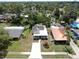 This aerial view shows the property's attractive landscaping and surrounding neighborhood at 1005 45Th W St, Bradenton, FL 34209