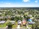 From above, admire the serene neighborhood with tree-lined streets surrounding the charming home at 1005 45Th W St, Bradenton, FL 34209