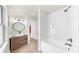 Modern bathroom featuring a tiled shower over tub and vessel sink with stylish vanity and fixtures at 1005 45Th W St, Bradenton, FL 34209