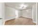 Bedroom features wood flooring, closet, recessed lighting, and neutral paint at 1005 45Th W St, Bradenton, FL 34209