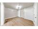 Spacious bedroom features wood flooring, dual closets, recessed lighting, and a ceiling fan at 1005 45Th W St, Bradenton, FL 34209