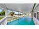 Exterior porch with bright teal painted floor and open view at 1005 45Th W St, Bradenton, FL 34209