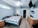 Comfortable bedroom with a large bed, walk-in closet, and ensuite bathroom at 1006 Tropical E Dr, Bradenton, FL 34208