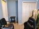 Office in bedroom featuring a writing desk, black chair and a large closet for storage at 1006 Tropical E Dr, Bradenton, FL 34208