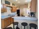 Well-equipped kitchen with a breakfast bar, providing a cozy spot for casual dining at 1006 Tropical E Dr, Bradenton, FL 34208