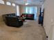 Spacious living room showcases a sectional sofa and TV area at 1006 Tropical E Dr, Bradenton, FL 34208
