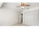 Bright bedroom with double closets, neutral carpet, and a ceiling fan at 1015 Hastings Ct, Lutz, FL 33548