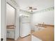 Vintage kitchen with retro appliances and tile flooring and access to the sink at 1015 Hastings Ct, Lutz, FL 33548