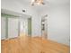 Living room with hardwood floors and view of other rooms in the home at 1015 Hastings Ct, Lutz, FL 33548