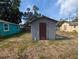 An exterior view of the yard and another building at 1028 E 93Rd Ave # A, Tampa, FL 33612