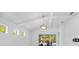 Living room with natural light and high ceilings at 12739 Rainwashed Loop, Parrish, FL 34219