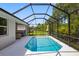 Beautiful backyard pool featuring a large screened in enclosure at 12739 Rainwashed Loop, Parrish, FL 34219