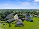 Aerial view of homes in a lush community, showcasing the beautiful landscape at 1280 Hill Flower Dr, Brooksville, FL 34604