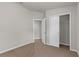 Spacious bedroom featuring neutral walls, carpet flooring, and closet at 1280 Hill Flower Dr, Brooksville, FL 34604