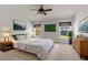 Relaxing bedroom features a ceiling fan and natural light, creating a calming atmosphere at 1280 Hill Flower Dr, Brooksville, FL 34604