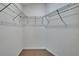 Walk-in closet with wire shelving, providing ample storage space for an organized wardrobe at 14047 Weddington Ter, Hudson, FL 34669