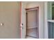 Warm and inviting foyer showcasing tile flooring visible through the open front door at 14047 Weddington Ter, Hudson, FL 34669