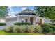 Charming single-Gathering home boasting a manicured lawn and welcoming entrance at 15405 Woodstar Landing Ct, Lithia, FL 33547