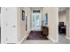 Elegant foyer featuring a double-door entry and tasteful decor at 15405 Woodstar Landing Ct, Lithia, FL 33547